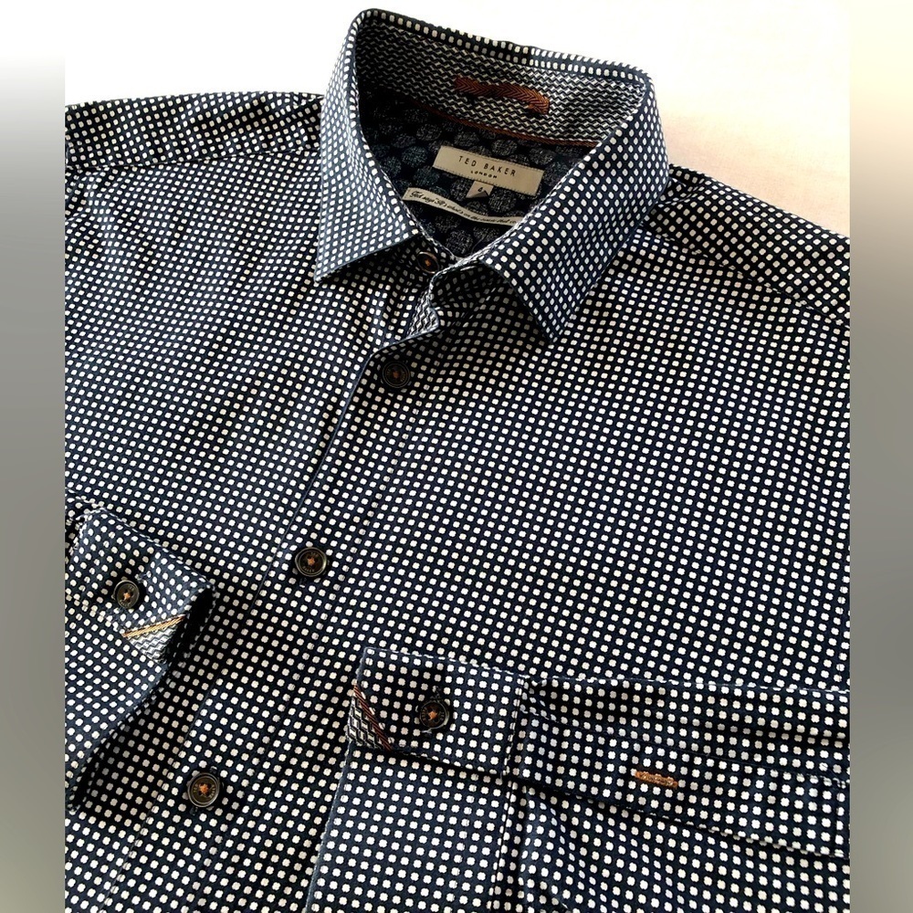 Ted Baker geometric print button down shirt 100%. It’s what’s inside that counts